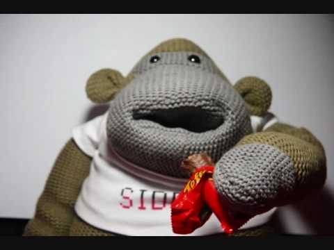 sock monkey eating candy