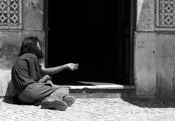 A beggar in BelÈm, Lisbon. He sat there for hours without moving.